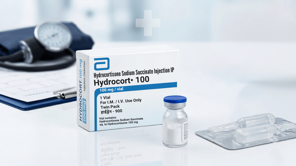 Hydrocort 100 vial and box with blood pressure monitor in clinical setting